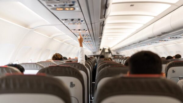 4 mistakes to stop making on a plane, according to an etiquette coach