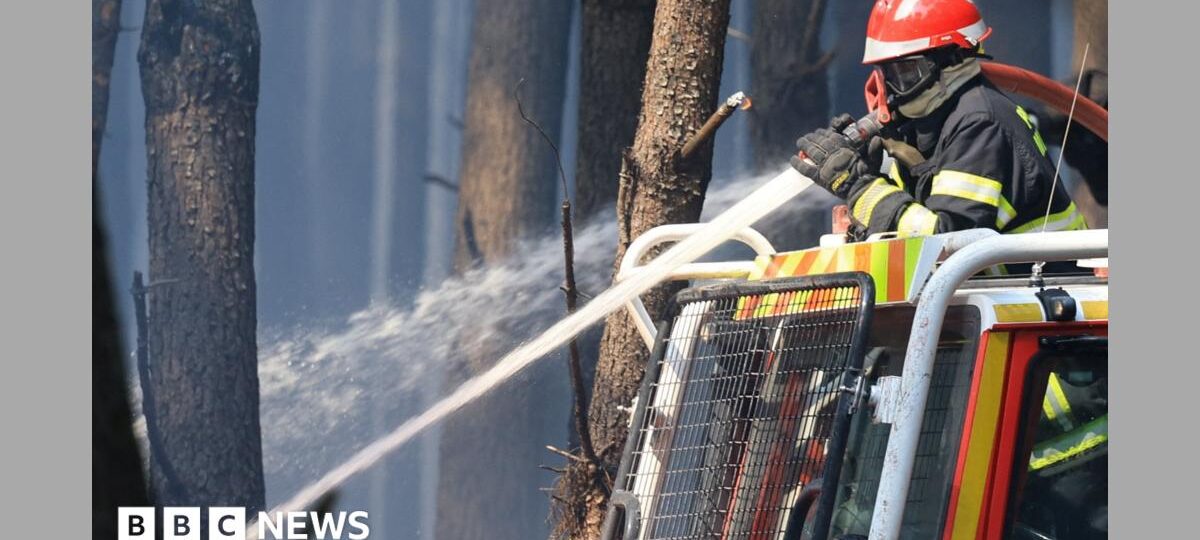 France fire crews face searing heat in battle to contain flames