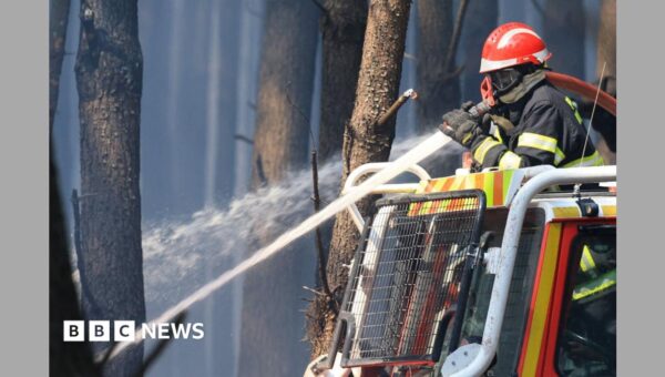 France fire crews face searing heat in battle to contain flames