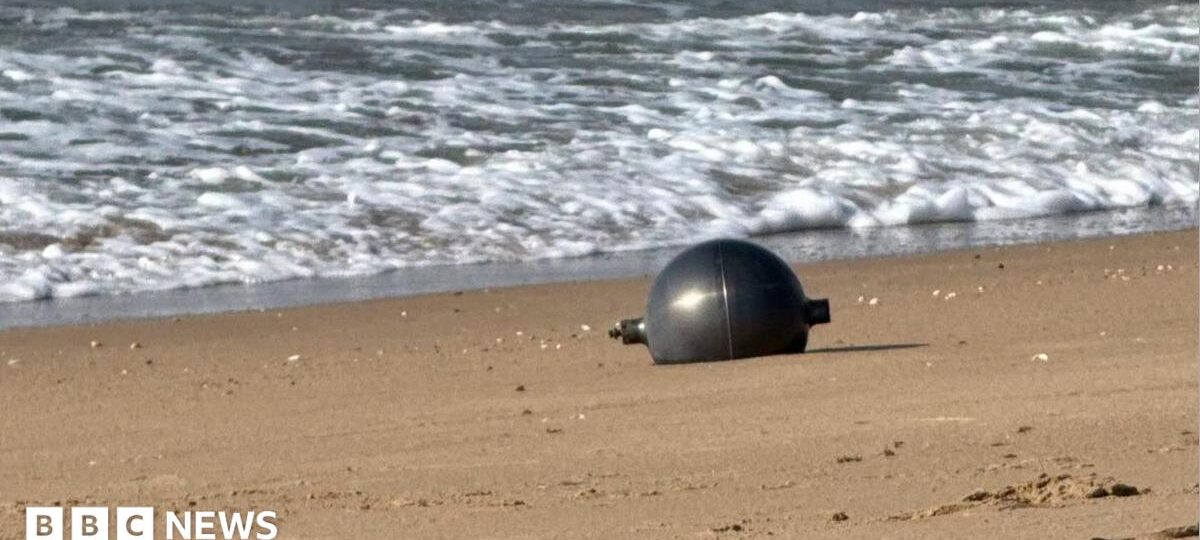 Australia probes mystery space balls that washed up on beach