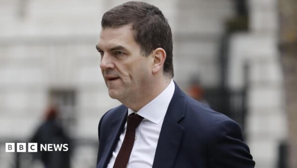 Former top official Robbins takes legal action over sacking