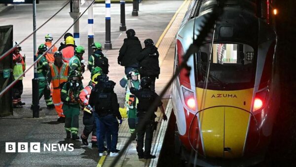 Man denies attempted murder of 10 people on train near Huntingdon