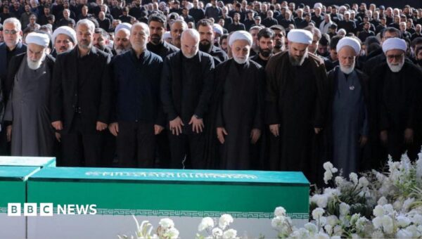 Iran’s supreme leader absent as senior officials attend ayatollah’s funeral