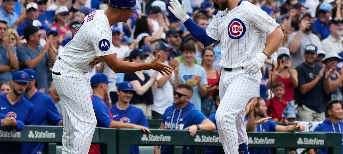 Former Cubs player Anthony Rizzo snares Michael Busch's home run ball in the Wrigley Field bleachers