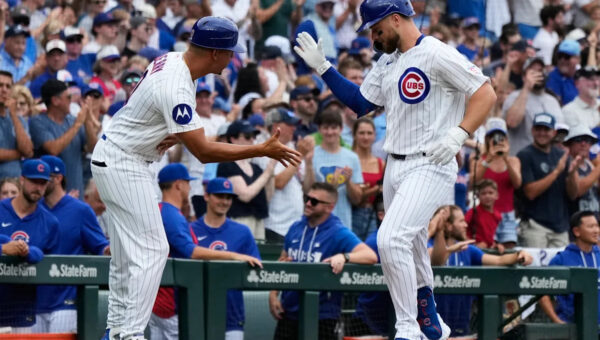 Former Cubs player Anthony Rizzo snares Michael Busch’s home run ball in the Wrigley Field bleachers