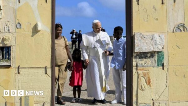 Pope urges Europe to do more for migrants while visiting gateway island