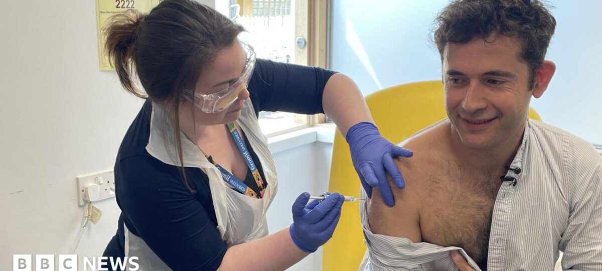First person gets new experimental vaccine for Ebola