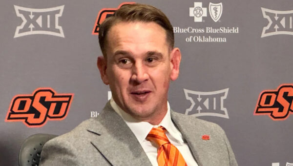 New Oklahoma State coach Eric Morris shoots and kills an armadillo in his yard