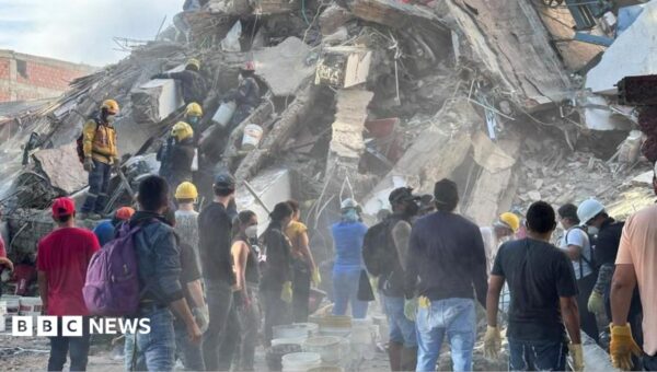Rescuers scramble for survivors with 180 dead in Colombia earthquake