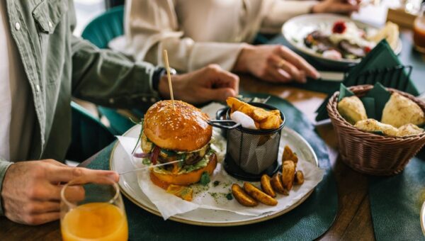 4 things you should never order in front of your boss or coworkers, according to an etiquette expert