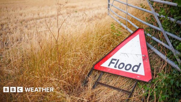 Downpours to continue for UK with risk of flash flooding