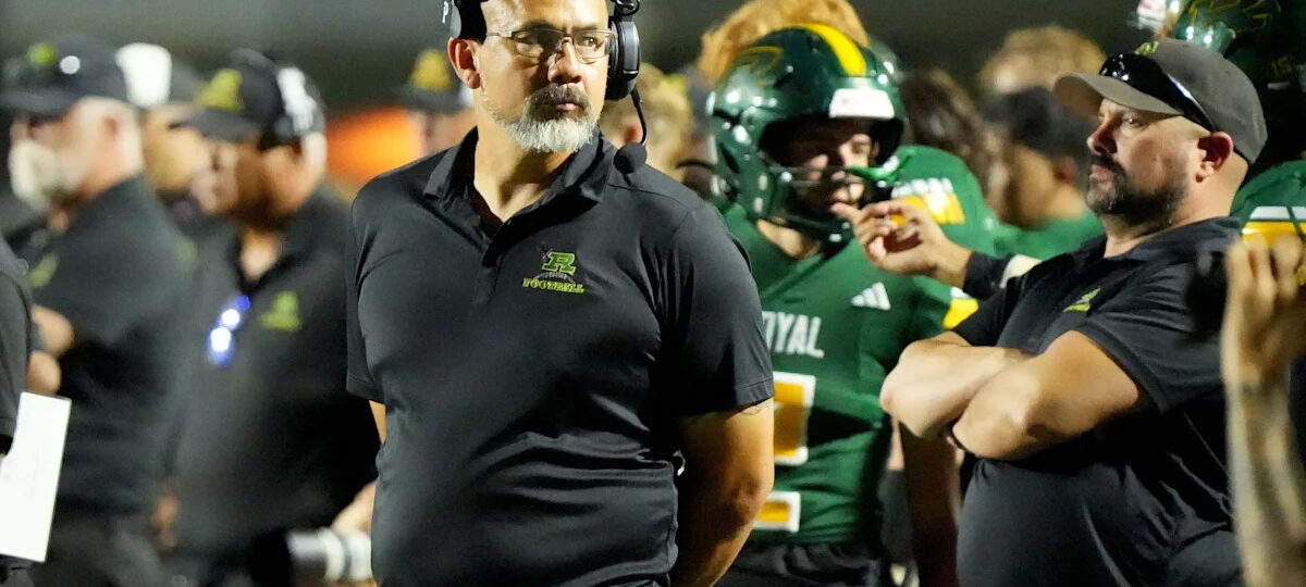 California high school football coach fired after kicking football at player