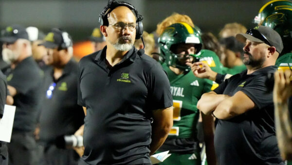 California high school football coach fired after kicking football at player