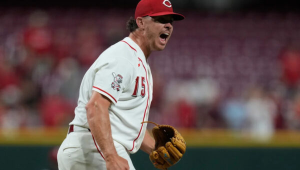McLain homers to back Lowder in the Reds' 3-2 victory over the A's