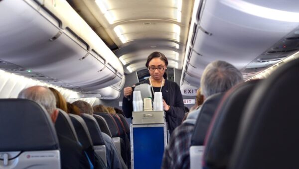 American Airlines is reversing its bet against seatback screens