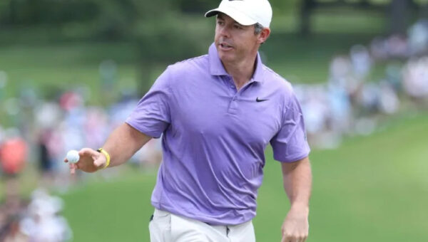 Hovland takes solo lead as McIlroy surges at Tour Championship