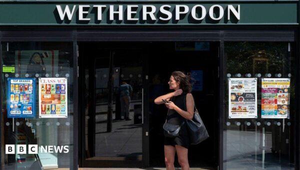 Wetherspoons bans customers playing music from phones in pubs