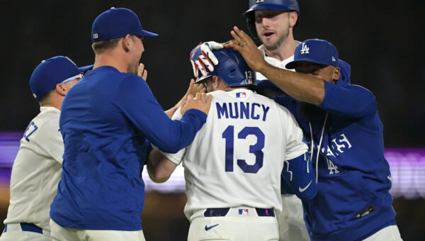 Former Tennessee baseball pitcher earns win in debut with Dodgers