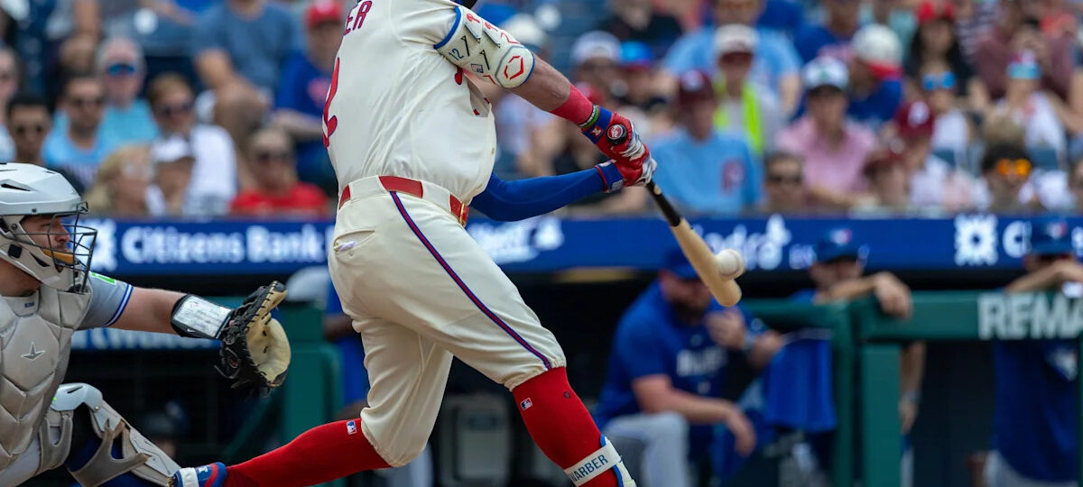 Schwarber hits 2 HRs, Hill delivers RBI single in 12th inning as Phillies beat Blue Jays 7-6