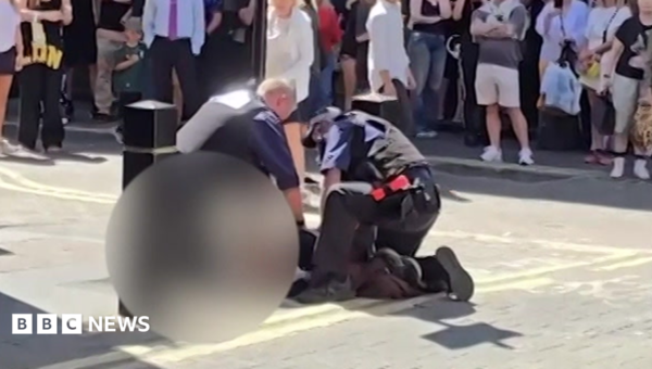 Woman arrested after four stabbed in central London