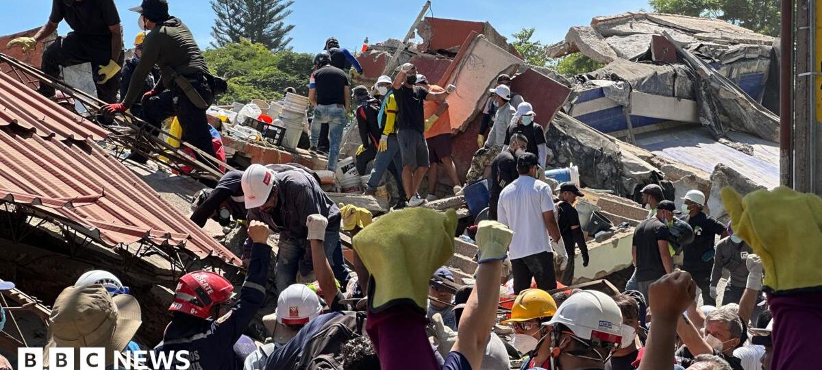Anguish of Colombian brother at rubble of building being searched for earthquake survivors