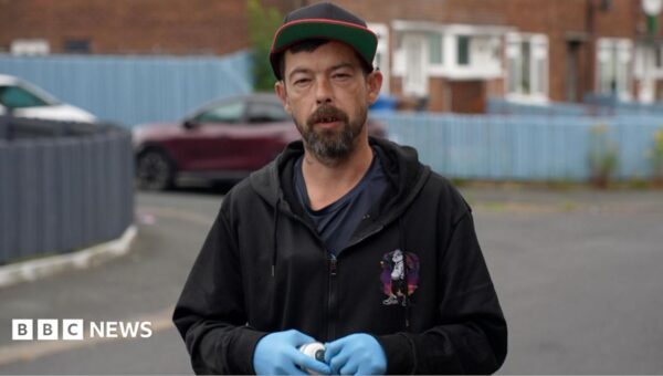 ‘Minion Man’ paints over estate’s obscene graffiti