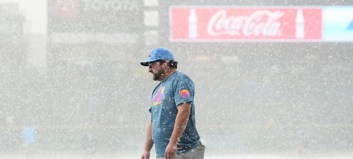 Sugano helps the Rockies beat the Royals 3-1 in game delayed at start by hailstorm