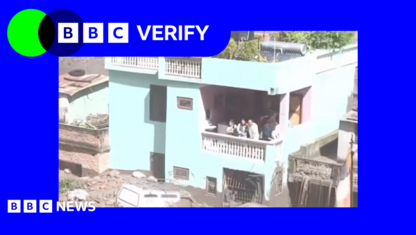 Videos show people survive floodwaters on balcony in Nepal