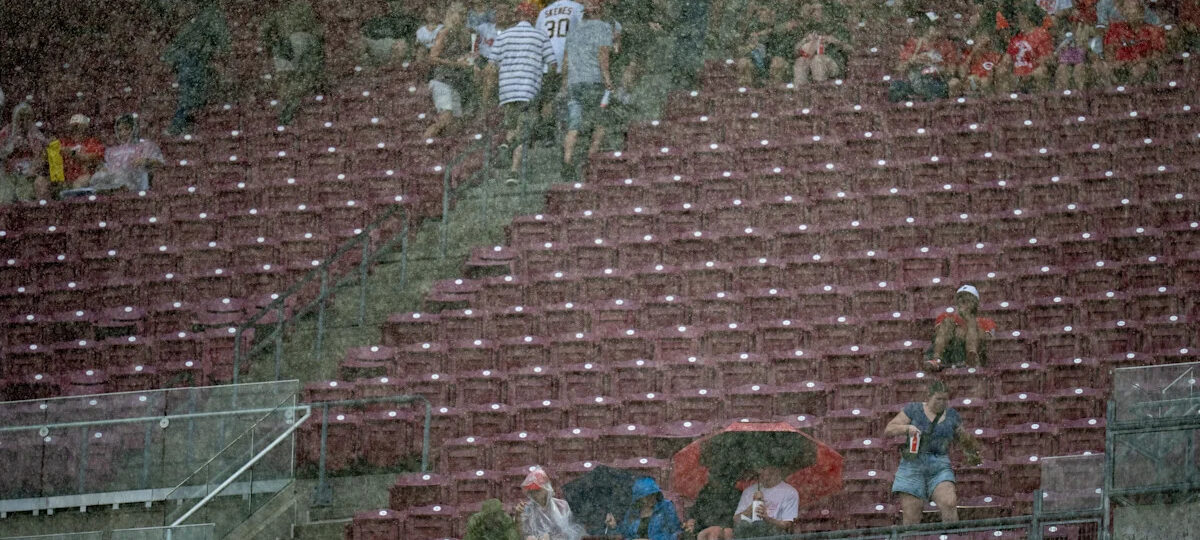 Reds, Pirates game paused as grounds crew fights to dry infield
