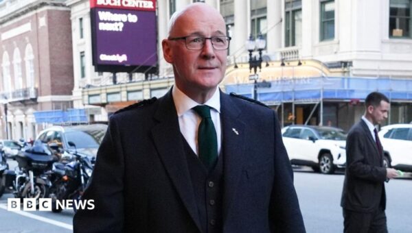 John Swinney defends £45,000 business-class flights to World Cup
