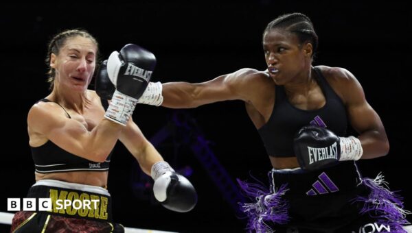 Dubois beats Moore to keep Baumgardner in picture