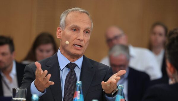Booking’s CEO says AI will have a ‘human cost’ — and he wants every employee to be ‘AI literate’ in case their job goes away