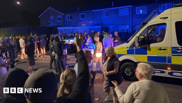 Two police officers injured during second night of anti-immigration disorder in Norfolk