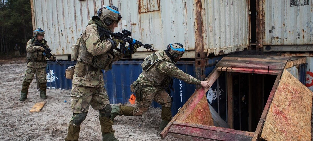 Ukrainian troops are training just beyond the war's reach on NATO soil. Training leaders say that's by design.