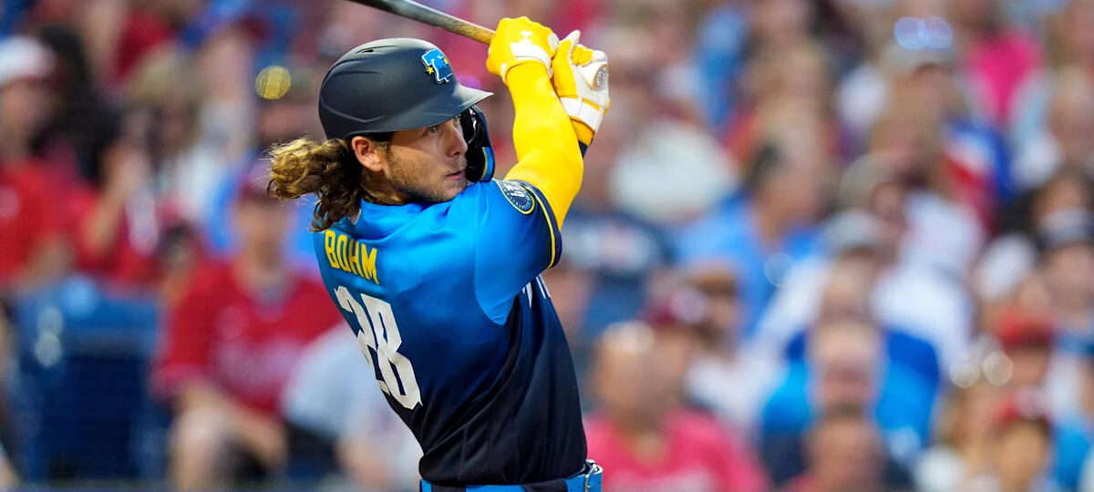 Bohm's triple in the 10th scores 2 runs as the Phillies beat the Cardinals 7-6