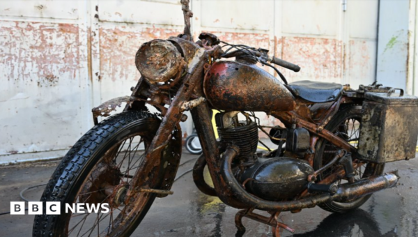 Danube river’s low water levels reveal remains of WWII soldiers and motorcycle