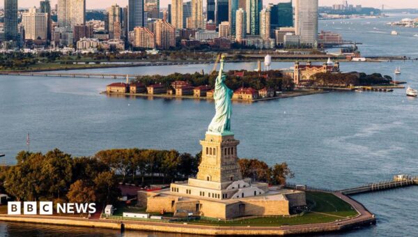 Man arrested after boat capsizes near Statue of Liberty killing woman and infant
