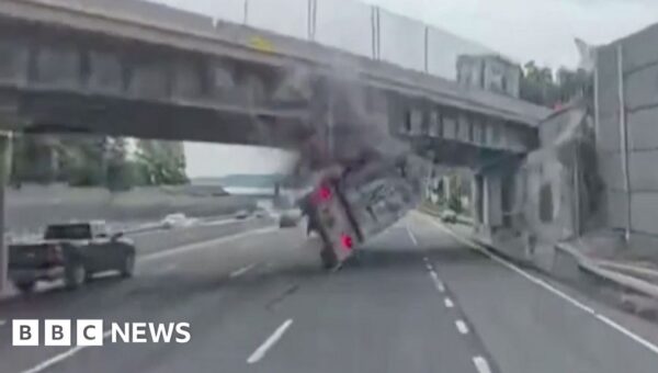 Dashcam video shows moment lorry slams into New York overpass