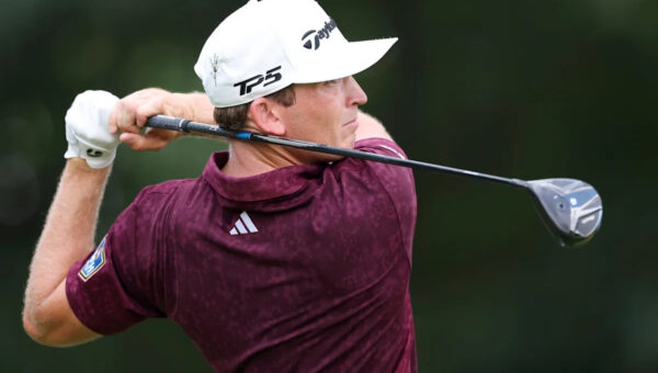 Slice? Jacob Bridgeman hits tee shot into a pizza stand at Tour Championship