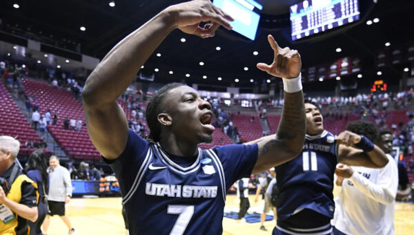 Utah State guard Kolby King announces Auburn basketball commitment