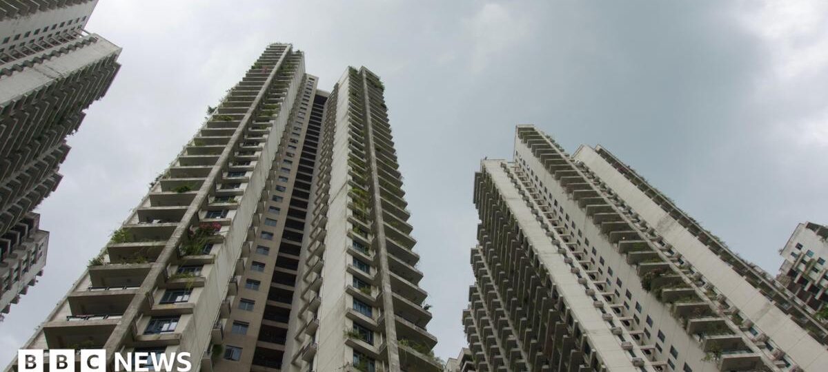 These seaside apartments were a ghost city - then police say scammers moved in