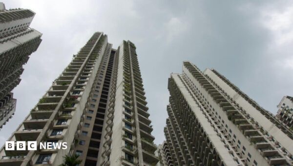 These seaside apartments were a ghost city – then police say scammers moved in