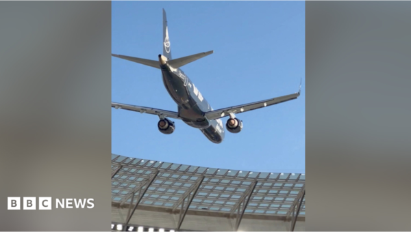 South African airline defends low-altitude aerial stunt over packed stadium