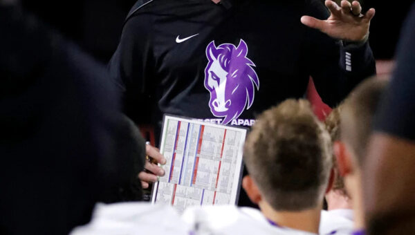 Former college football coach loses first game back in high school ranks in OT thriller