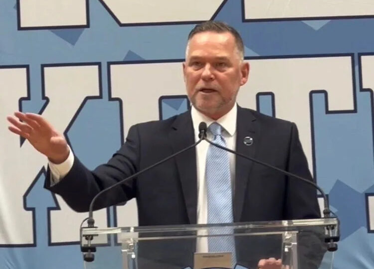 UNC basketball coach Michael Malone doing opposite of Hubert Davis