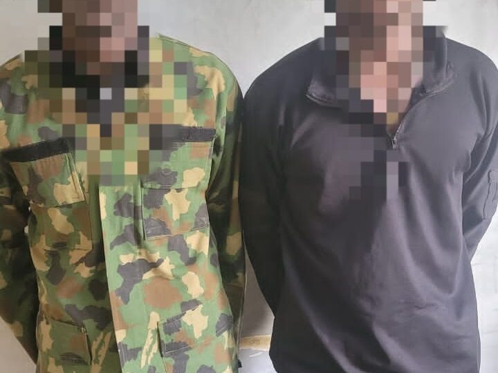 Two arrested for allegedly impersonating soldiers years after leaving military school