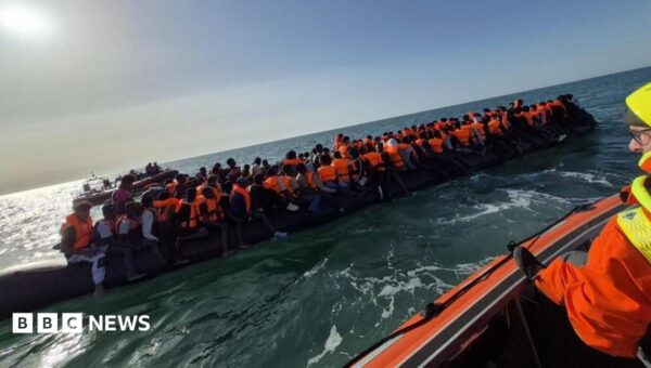 Number of asylum seekers in hotels halves in a year