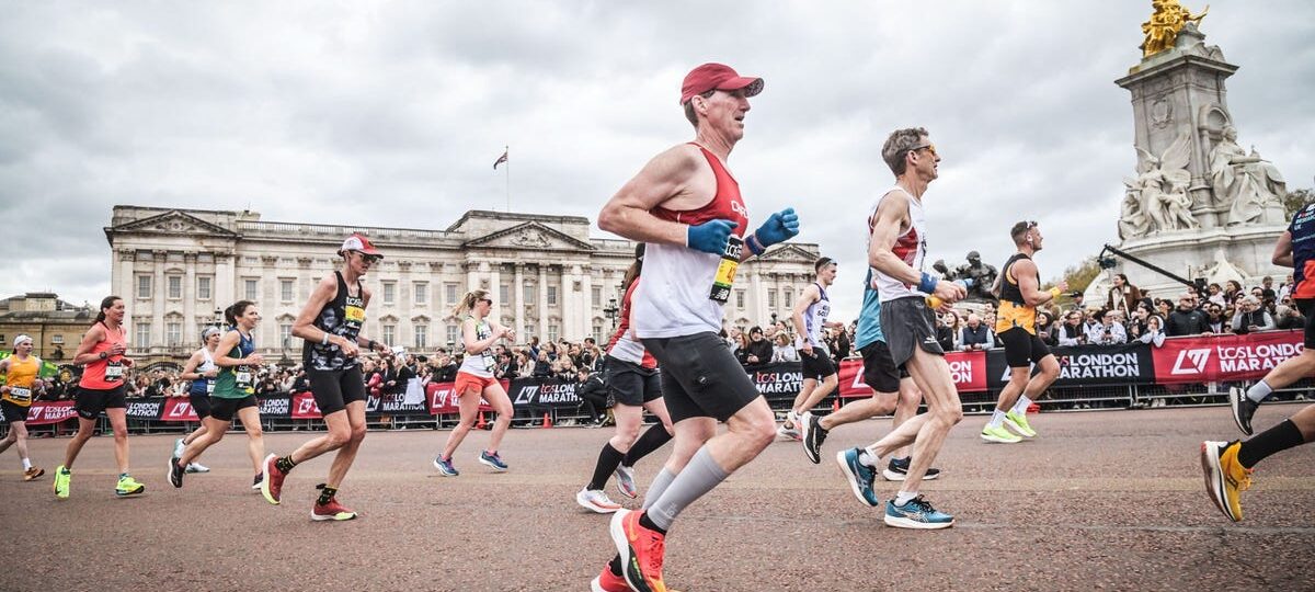 One runner spent $40,000, another took a second job. Marathoners are making big sacrifices to chase medals worldwide.