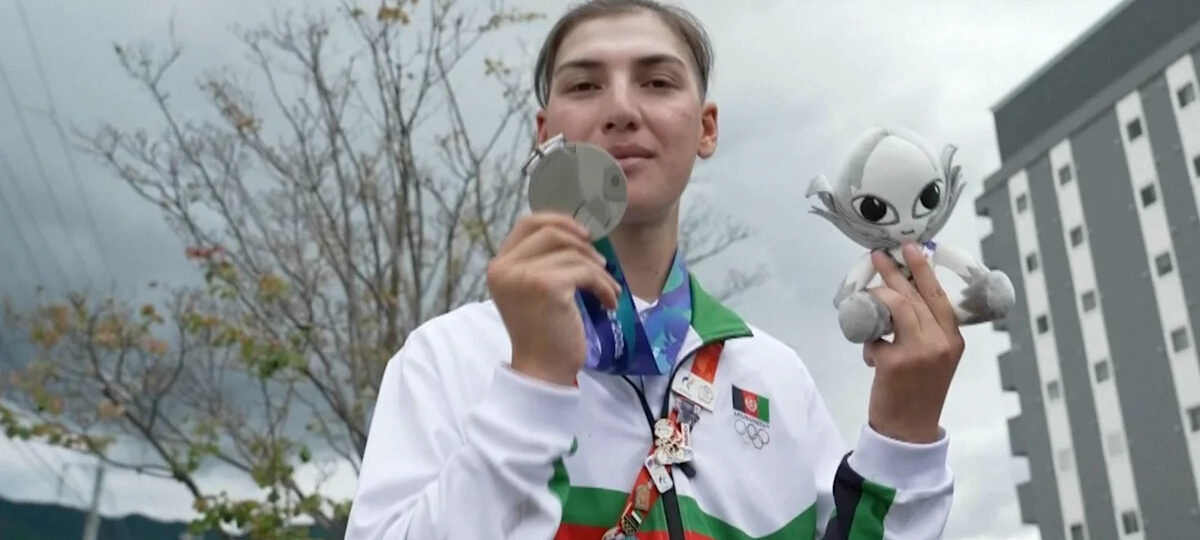 Afghan female cyclist wins silver at Asian Games after disguising herself as a man to train