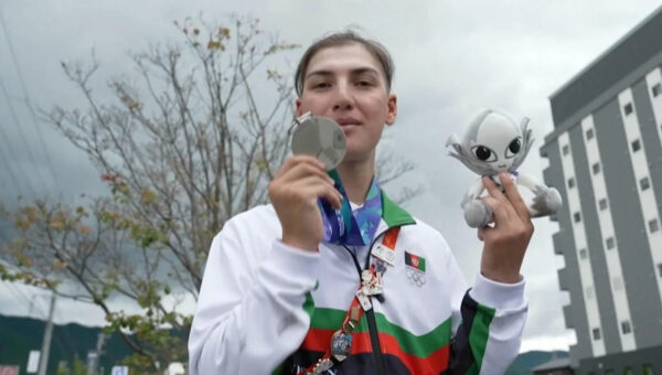 Afghan female cyclist wins silver at Asian Games after disguising herself as a man to train